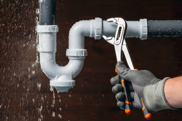Professional Emergency Plumber technician working in Carle Place, NY